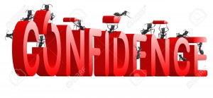 7790494-confidence-building-self-esteem-and-belief-psychology-red-word-built-by-ants-Stock-Photo